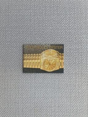 Gold Watch  booklet Featuring Rolex Oyster Image